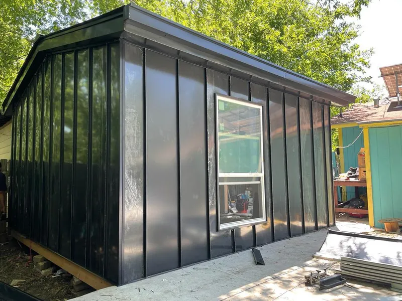 Black standing seam metal wall panels for Metal Roof Installation in Oakville