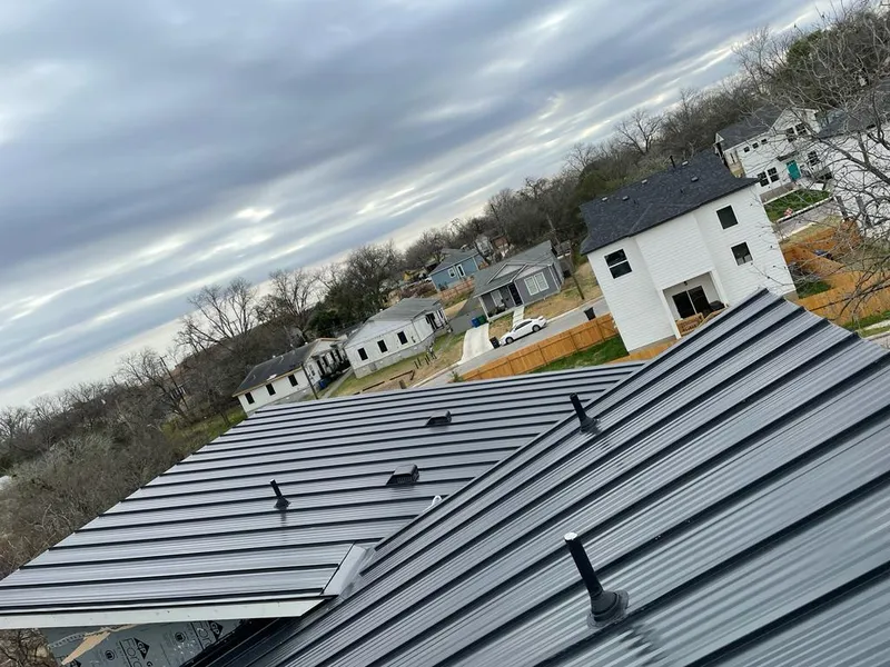 Standing seam metal roof panels with vents for Skylight Repair in Oakville
